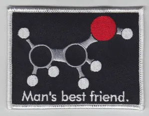 Svart halarmärke med en molekylmodell och texten Man's best friend